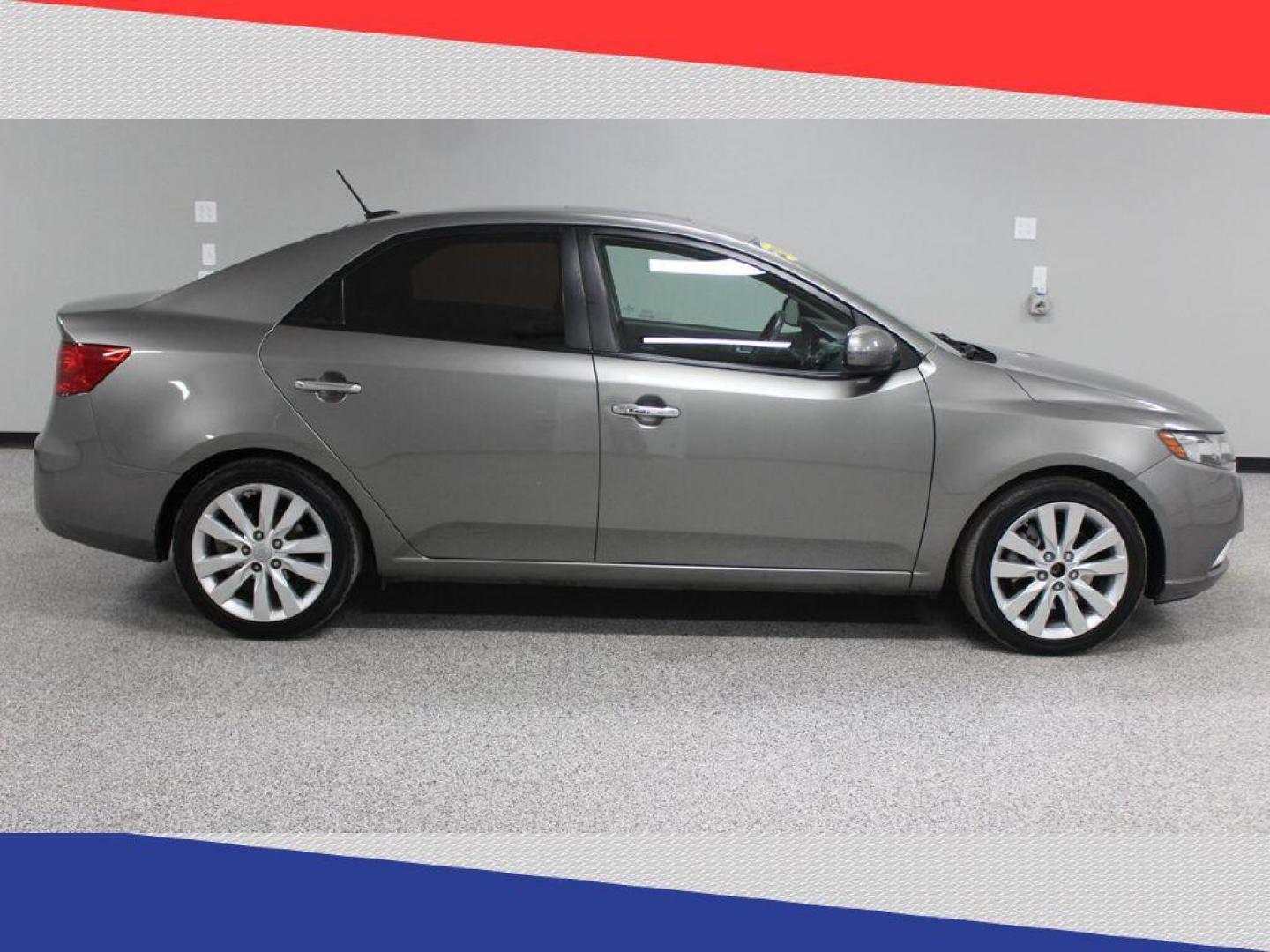 2012 Kia Forte SX (KNAFW4A31C5) with an 2.4L L4 DOHC 16V engine, Automatic transmission, located at 5170 N La Cholla Blvd, Tucson, AZ, 85705, (520) 989-0282, 32.228245, -111.011742 - 2012 Kia Forte - Photo#1