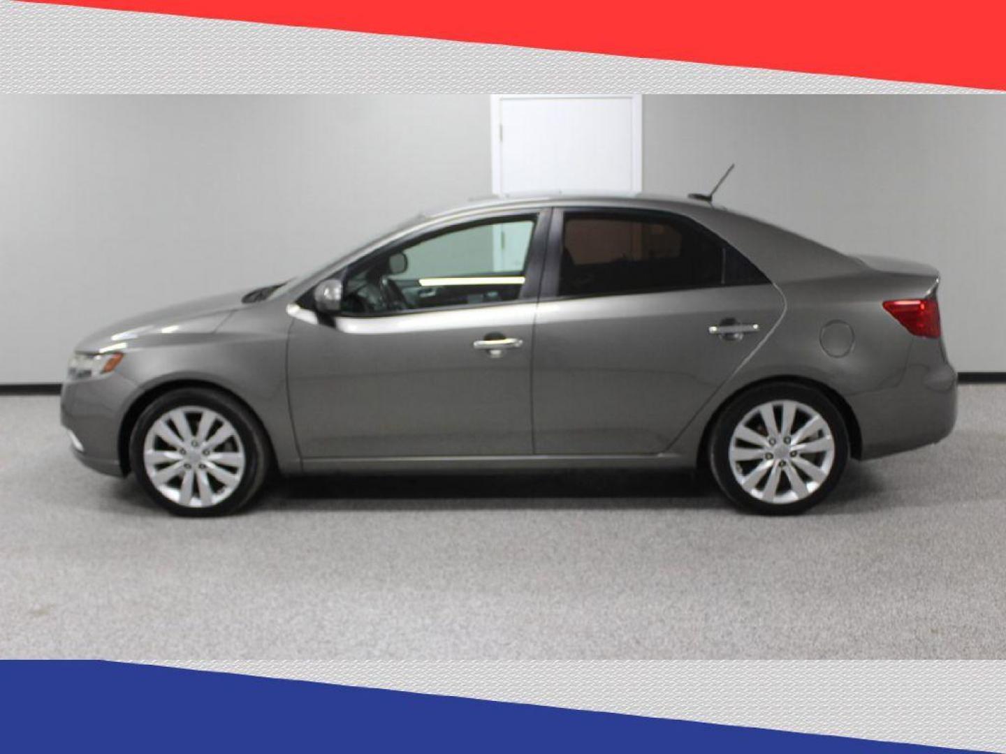 2012 Kia Forte SX (KNAFW4A31C5) with an 2.4L L4 DOHC 16V engine, Automatic transmission, located at 5170 N La Cholla Blvd, Tucson, AZ, 85705, (520) 989-0282, 32.228245, -111.011742 - 2012 Kia Forte - Photo#5