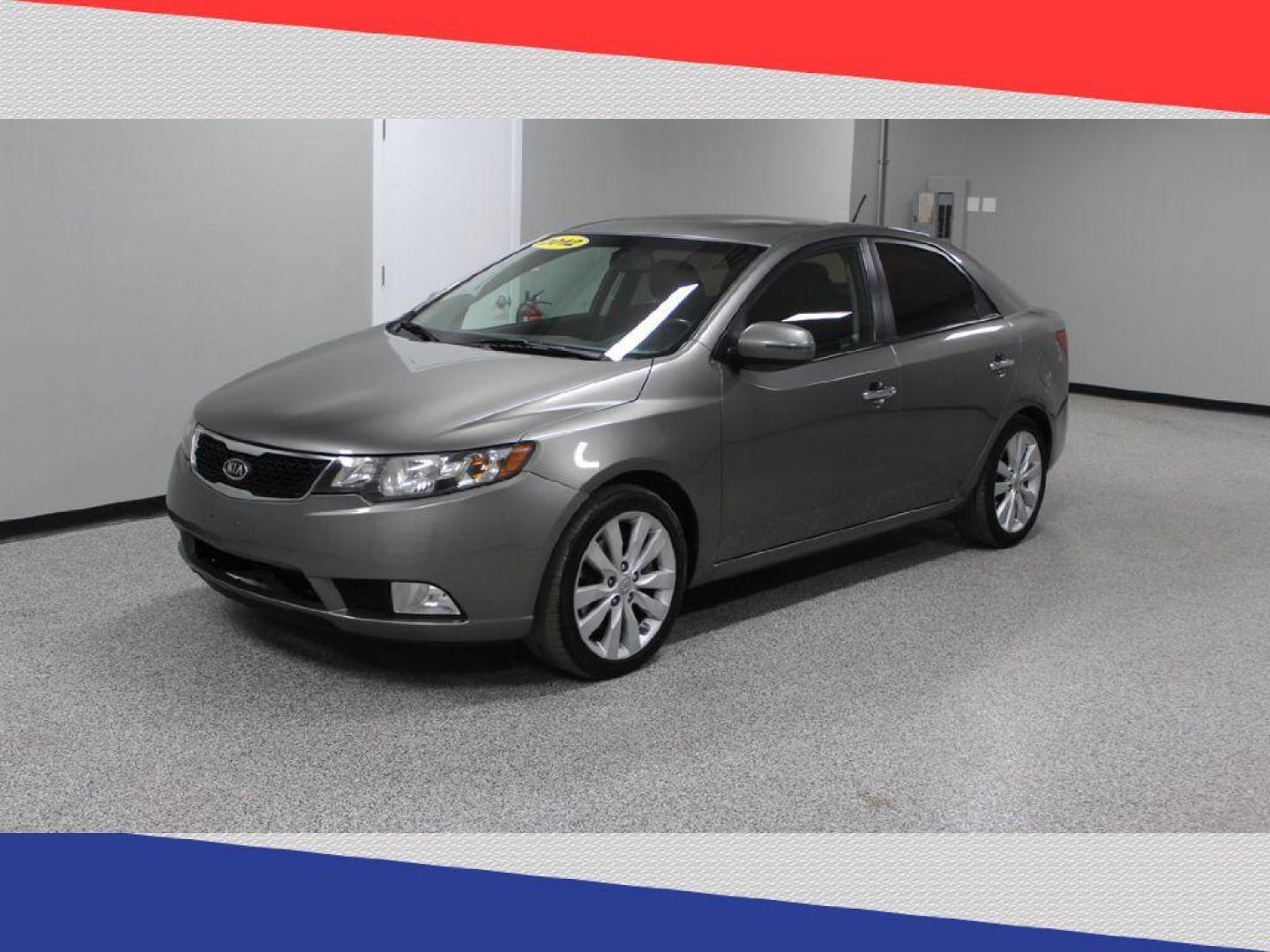 2012 Kia Forte SX (KNAFW4A31C5) with an 2.4L L4 DOHC 16V engine, Automatic transmission, located at 5170 N La Cholla Blvd, Tucson, AZ, 85705, (520) 989-0282, 32.228245, -111.011742 - 2012 Kia Forte - Photo#6