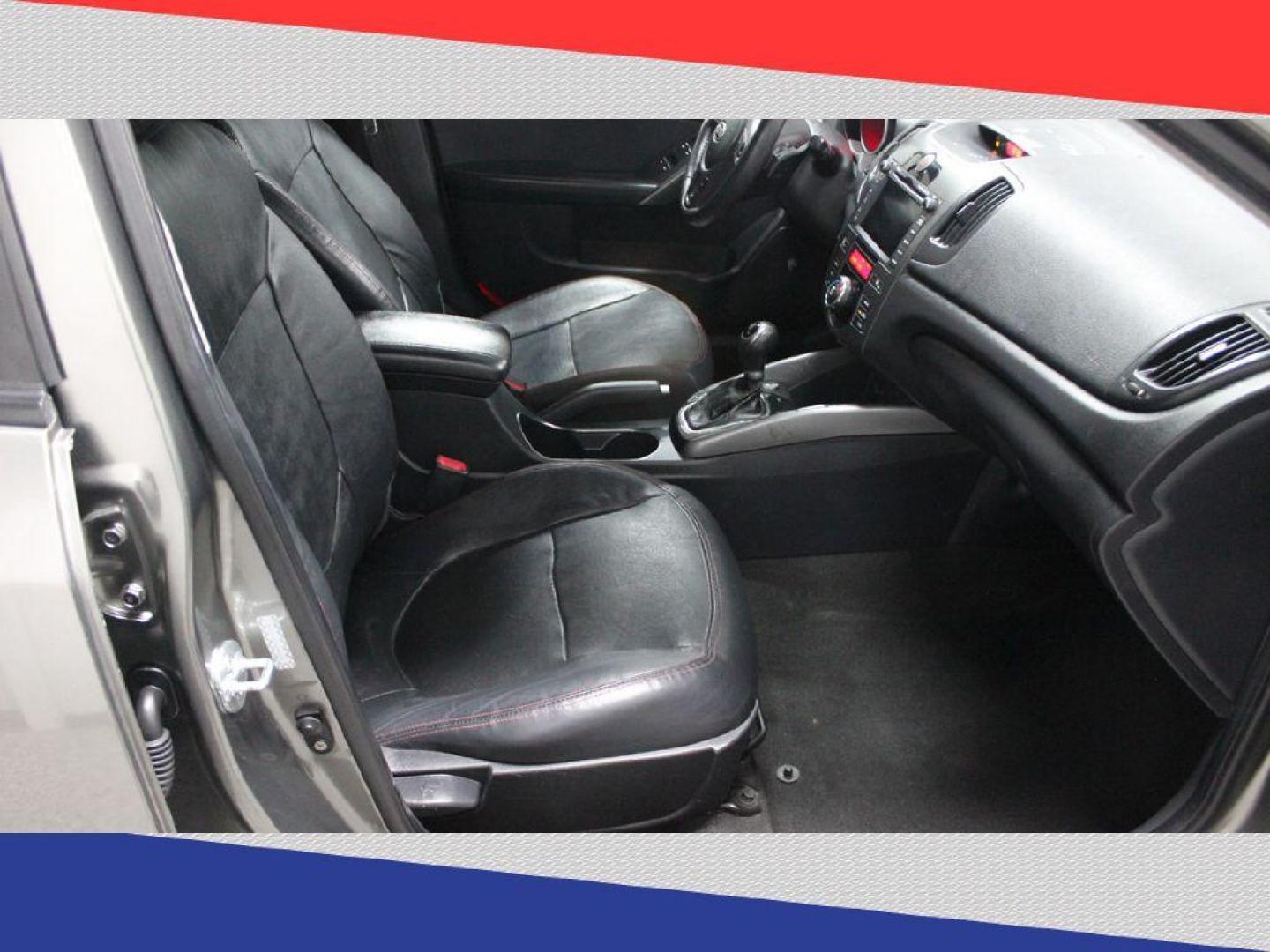 2012 Kia Forte SX (KNAFW4A31C5) with an 2.4L L4 DOHC 16V engine, Automatic transmission, located at 5170 N La Cholla Blvd, Tucson, AZ, 85705, (520) 989-0282, 32.228245, -111.011742 - 2012 Kia Forte - Photo#23