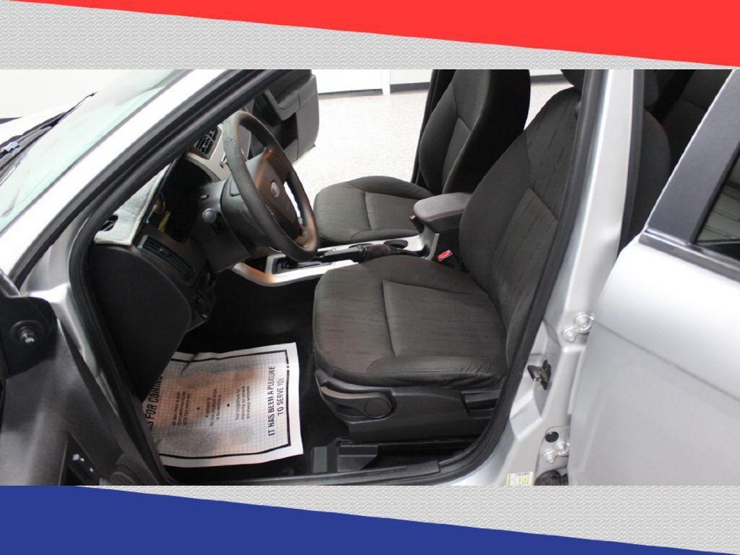 2010 Ford Focus SE Sedan (1FAHP3FN3AW) with an 2.0L L4 DOHC 16V engine, Automatic transmission, located at 5170 N La Cholla Blvd, Tucson, AZ, 85705, (520) 989-0282, 32.228245, -111.011742 - 2010 Ford Focus - Photo#10