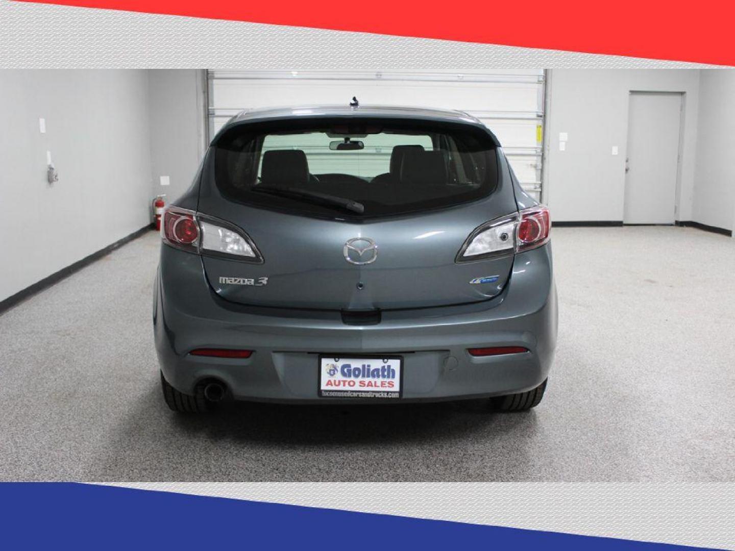 2013 Mazda MAZDA3 i Grand Touring MT 5-Door (JM1BL1MP7D1) with an 2.0L L4 DOHC 16V engine, 5-Speed Manual transmission, located at 5170 N La Cholla Blvd, Tucson, AZ, 85705, (520) 989-0282, 32.228245, -111.011742 - 2013 Mazda MAZDA3 - Photo#3