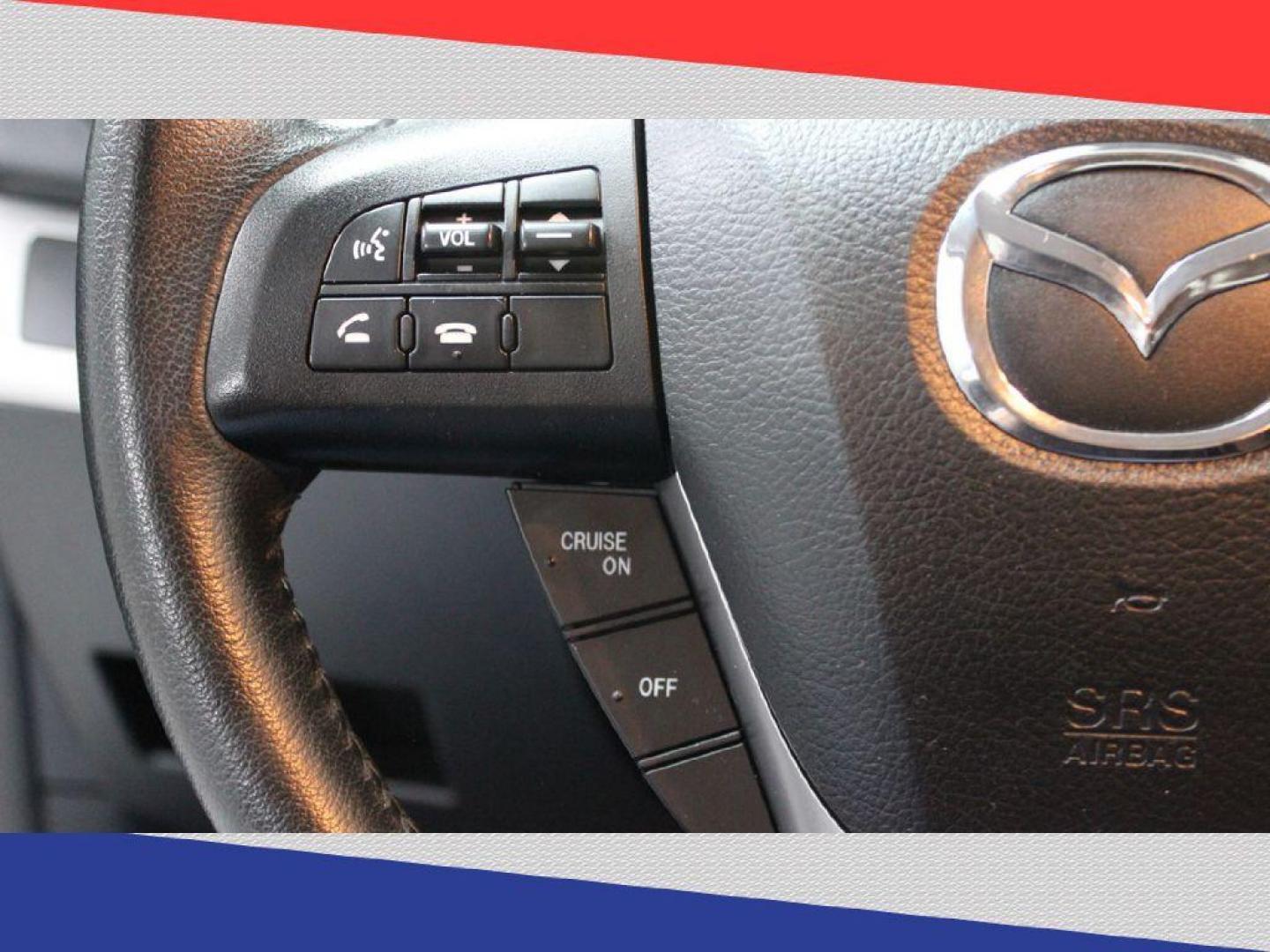 2013 Mazda MAZDA3 i Grand Touring MT 5-Door (JM1BL1MP7D1) with an 2.0L L4 DOHC 16V engine, 5-Speed Manual transmission, located at 5170 N La Cholla Blvd, Tucson, AZ, 85705, (520) 989-0282, 32.228245, -111.011742 - 2013 Mazda MAZDA3 - Photo#14