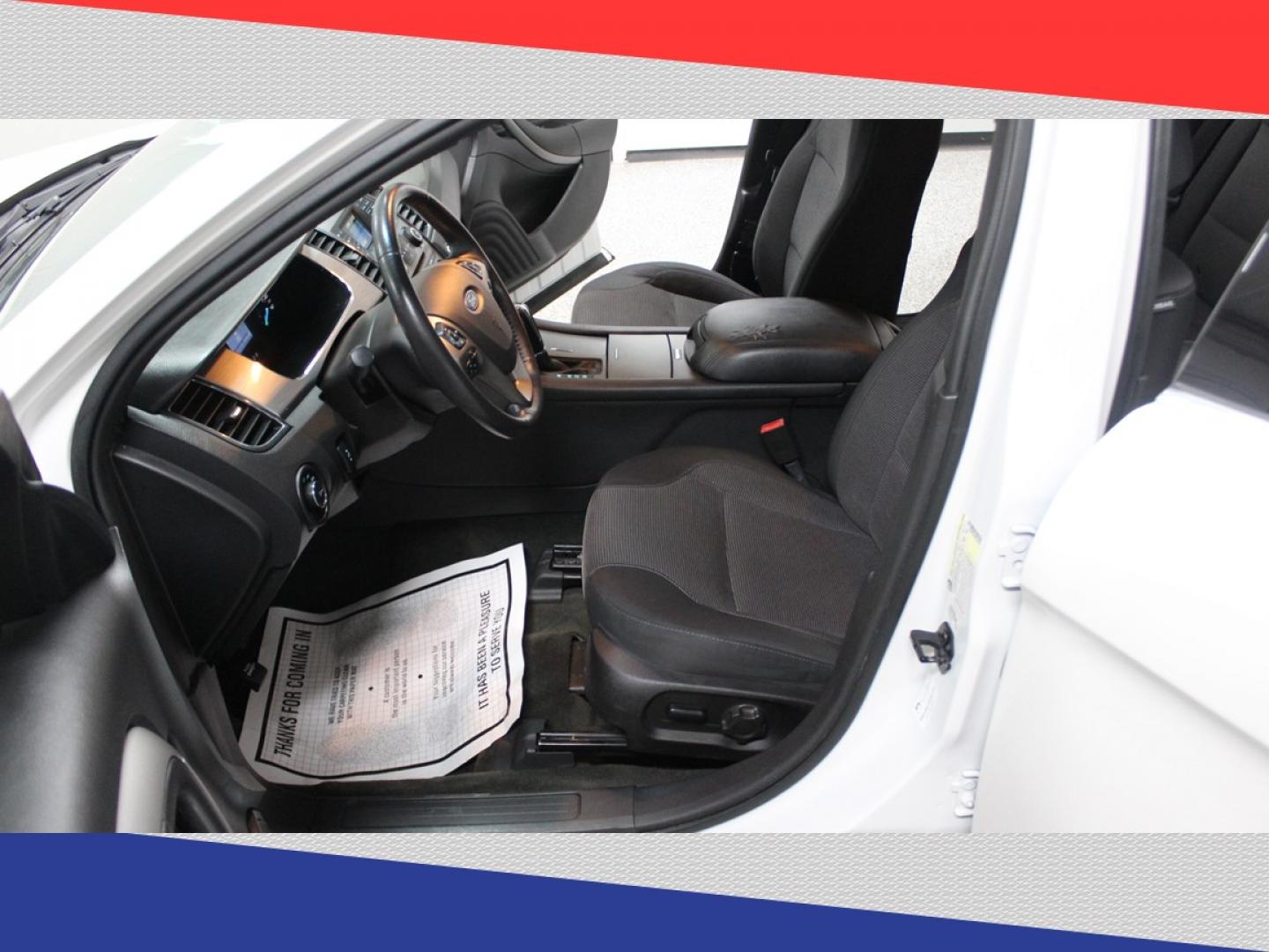 2015 Ford Taurus SEL FWD (1FAHP2E95FG) with an 2.0L L4 DOHC 16V engine, 6-Speed Automatic transmission, located at 5170 N La Cholla Blvd, Tucson, AZ, 85705, (520) 989-0282, 32.228245, -111.011742 - 2015 Ford Taurus - Photo#10