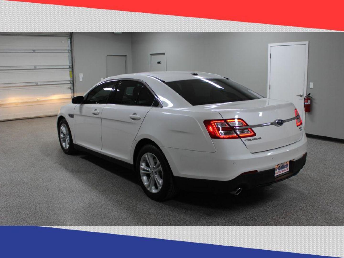 2015 Ford Taurus SEL FWD (1FAHP2E95FG) with an 2.0L L4 DOHC 16V engine, 6-Speed Automatic transmission, located at 5170 N La Cholla Blvd, Tucson, AZ, 85705, (520) 989-0282, 32.228245, -111.011742 - 2015 Ford Taurus - Photo#4
