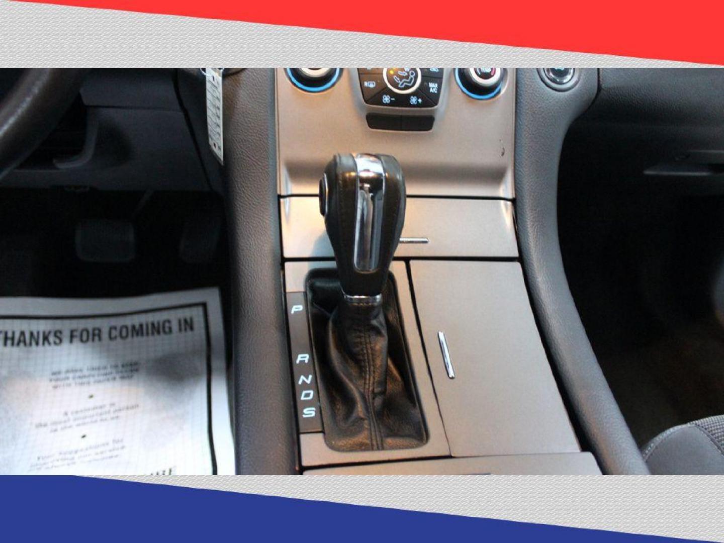 2015 Ford Taurus SEL FWD (1FAHP2E95FG) with an 2.0L L4 DOHC 16V engine, 6-Speed Automatic transmission, located at 5170 N La Cholla Blvd, Tucson, AZ, 85705, (520) 989-0282, 32.228245, -111.011742 - 2015 Ford Taurus - Photo#22
