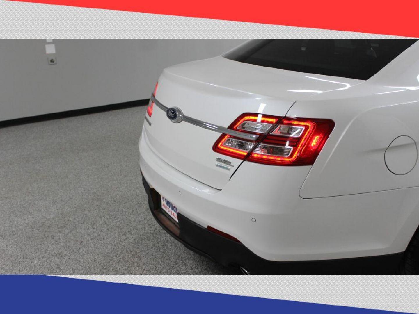 2015 Ford Taurus SEL FWD (1FAHP2E95FG) with an 2.0L L4 DOHC 16V engine, 6-Speed Automatic transmission, located at 5170 N La Cholla Blvd, Tucson, AZ, 85705, (520) 989-0282, 32.228245, -111.011742 - 2015 Ford Taurus - Photo#27