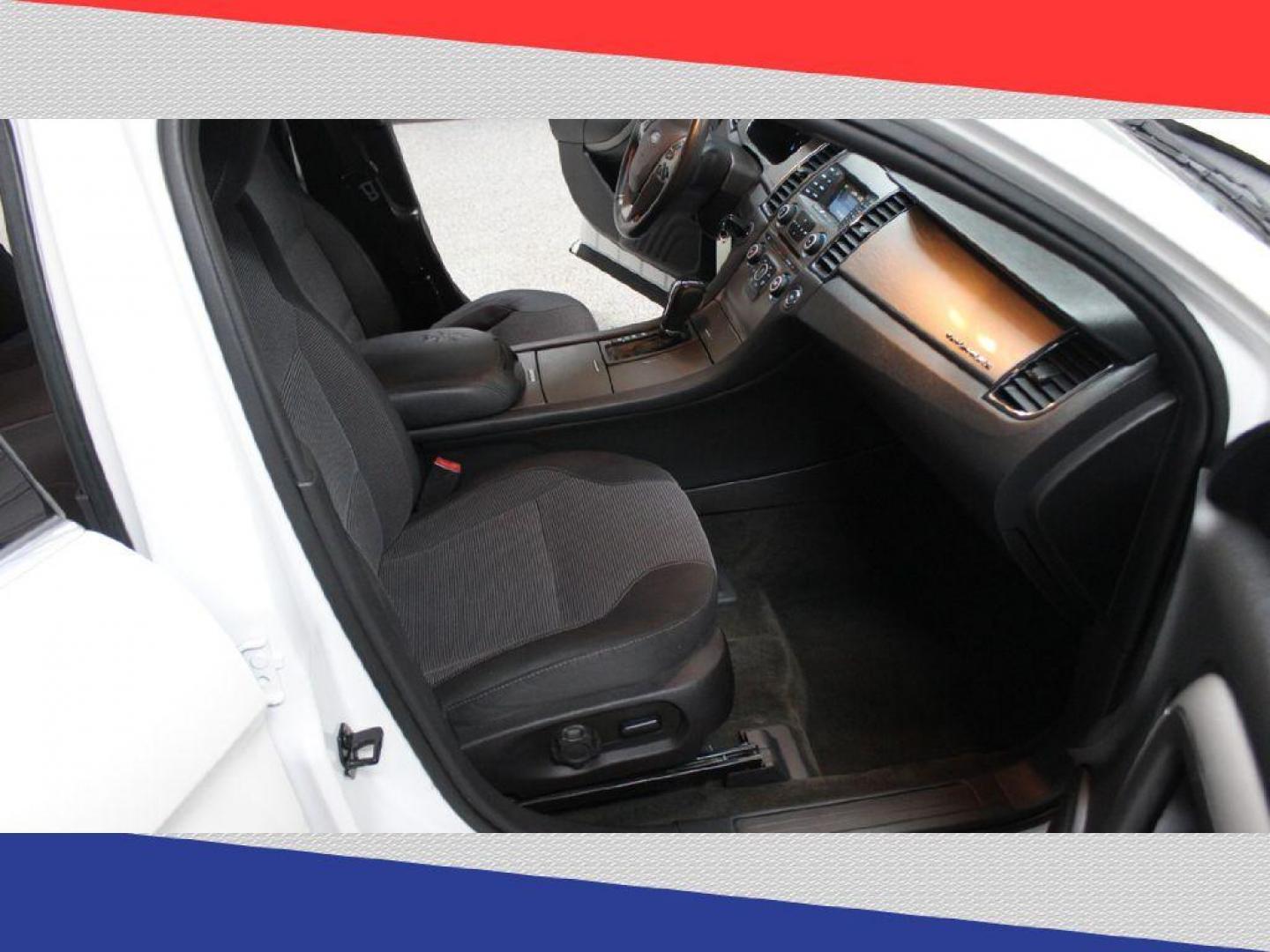 2015 Ford Taurus SEL FWD (1FAHP2E95FG) with an 2.0L L4 DOHC 16V engine, 6-Speed Automatic transmission, located at 5170 N La Cholla Blvd, Tucson, AZ, 85705, (520) 989-0282, 32.228245, -111.011742 - 2015 Ford Taurus - Photo#29