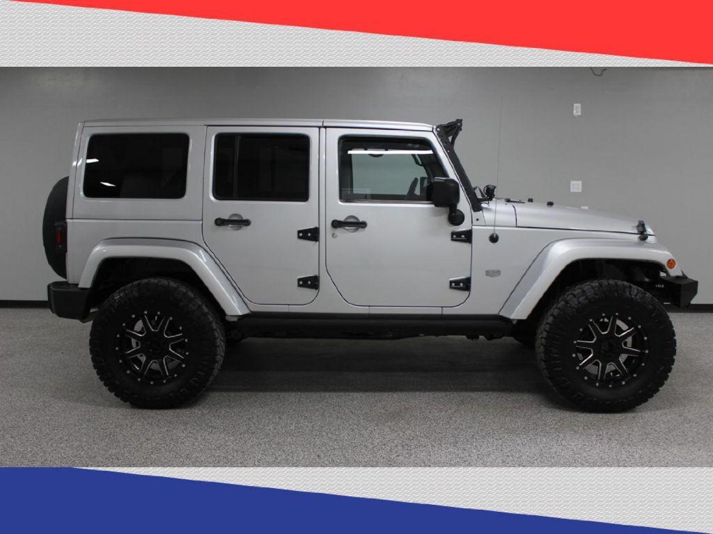 2011 Jeep Wrangler Jeep 70th Anniversary (1J4BA7H1XBL) with an 3.8L V6 OHV 12V engine, Automatic transmission, located at 5170 N La Cholla Blvd, Tucson, AZ, 85705, (520) 989-0282, 32.228245, -111.011742 - 2011 Jeep Wrangler - Photo#1