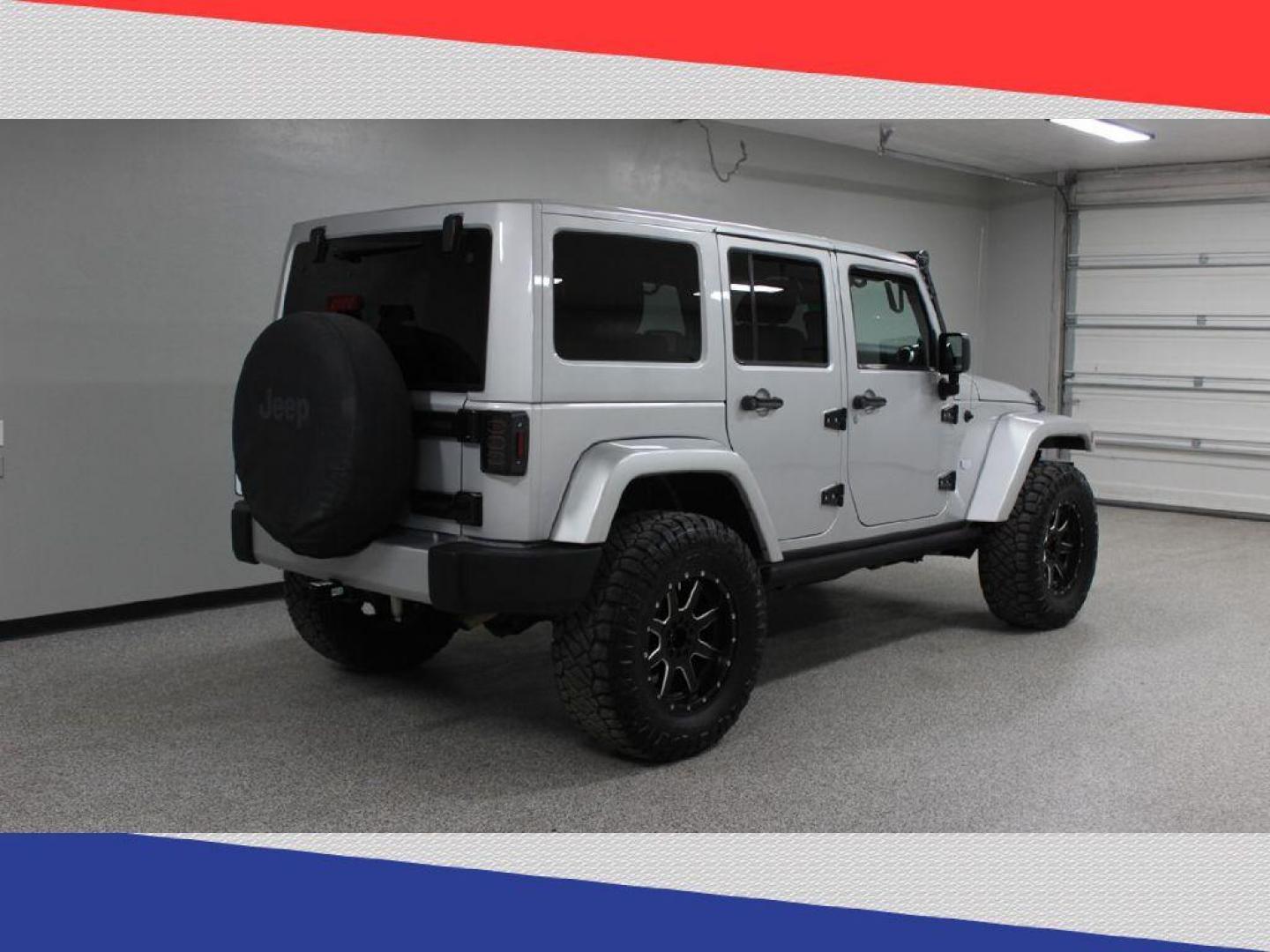 2011 Jeep Wrangler Jeep 70th Anniversary (1J4BA7H1XBL) with an 3.8L V6 OHV 12V engine, Automatic transmission, located at 5170 N La Cholla Blvd, Tucson, AZ, 85705, (520) 989-0282, 32.228245, -111.011742 - 2011 Jeep Wrangler - Photo#2