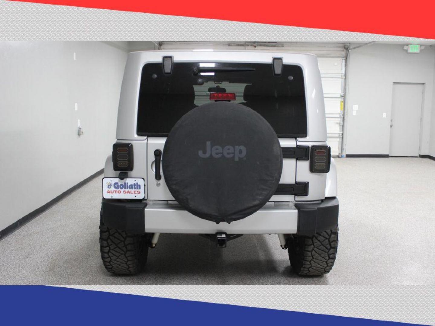 2011 Jeep Wrangler Jeep 70th Anniversary (1J4BA7H1XBL) with an 3.8L V6 OHV 12V engine, Automatic transmission, located at 5170 N La Cholla Blvd, Tucson, AZ, 85705, (520) 989-0282, 32.228245, -111.011742 - 2011 Jeep Wrangler - Photo#3