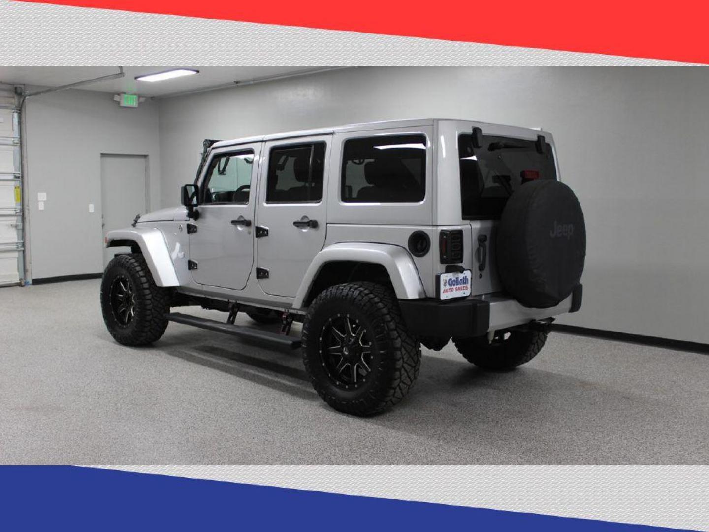 2011 Jeep Wrangler Jeep 70th Anniversary (1J4BA7H1XBL) with an 3.8L V6 OHV 12V engine, Automatic transmission, located at 5170 N La Cholla Blvd, Tucson, AZ, 85705, (520) 989-0282, 32.228245, -111.011742 - 2011 Jeep Wrangler - Photo#4