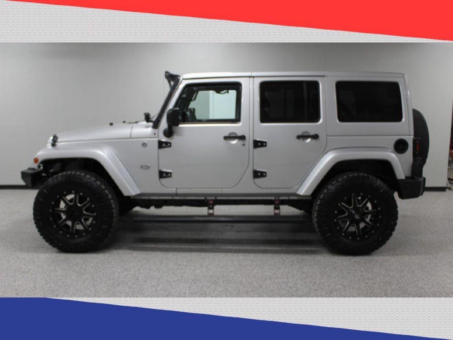 2011 Jeep Wrangler Jeep 70th Anniversary (1J4BA7H1XBL) with an 3.8L V6 OHV 12V engine, Automatic transmission, located at 5170 N La Cholla Blvd, Tucson, AZ, 85705, (520) 989-0282, 32.228245, -111.011742 - 2011 Jeep Wrangler - Photo#5
