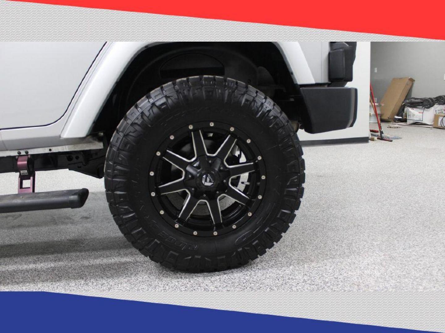 2011 Jeep Wrangler Jeep 70th Anniversary (1J4BA7H1XBL) with an 3.8L V6 OHV 12V engine, Automatic transmission, located at 5170 N La Cholla Blvd, Tucson, AZ, 85705, (520) 989-0282, 32.228245, -111.011742 - 2011 Jeep Wrangler - Photo#34