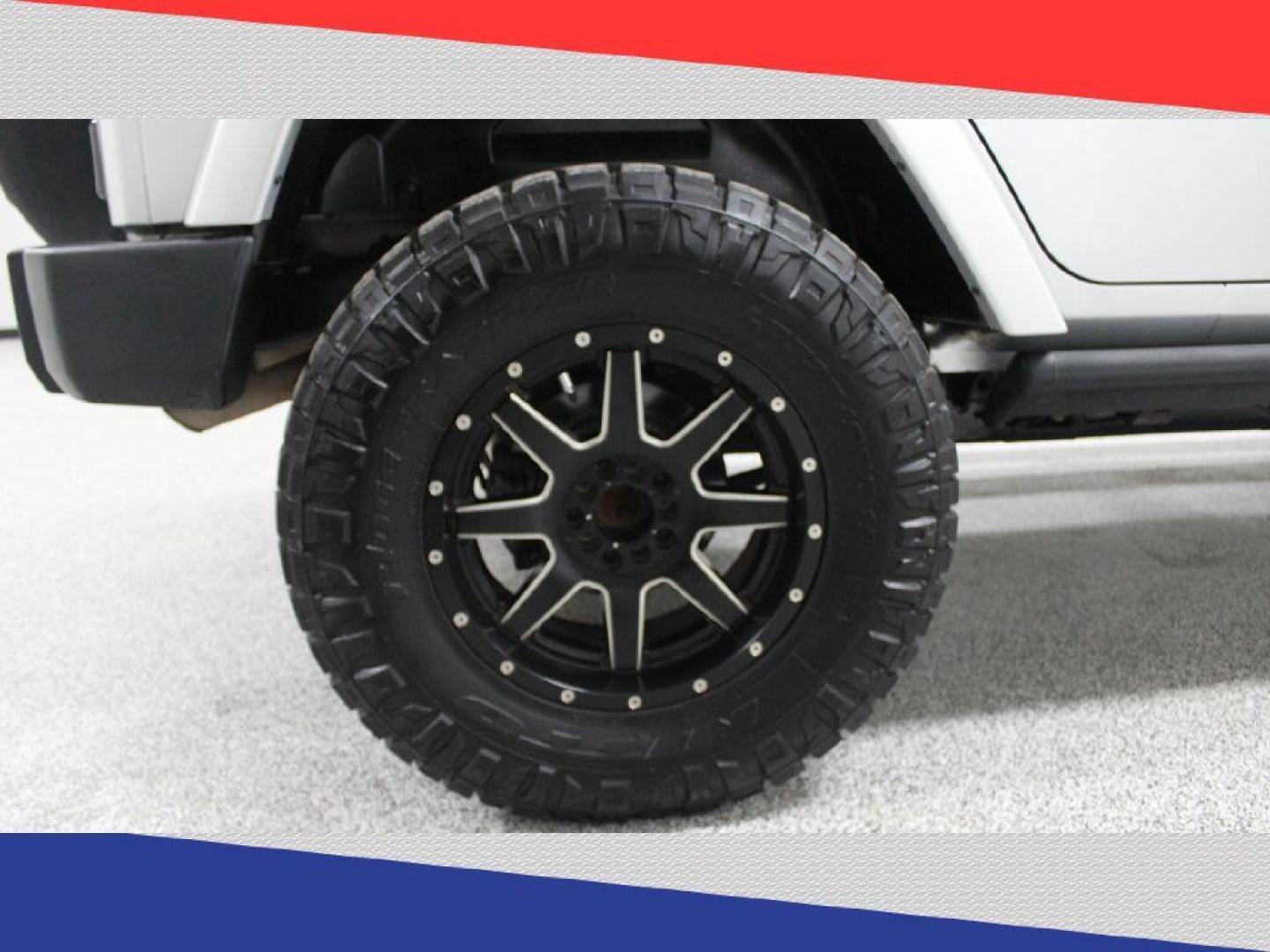 2011 Jeep Wrangler Jeep 70th Anniversary (1J4BA7H1XBL) with an 3.8L V6 OHV 12V engine, Automatic transmission, located at 5170 N La Cholla Blvd, Tucson, AZ, 85705, (520) 989-0282, 32.228245, -111.011742 - 2011 Jeep Wrangler - Photo#35