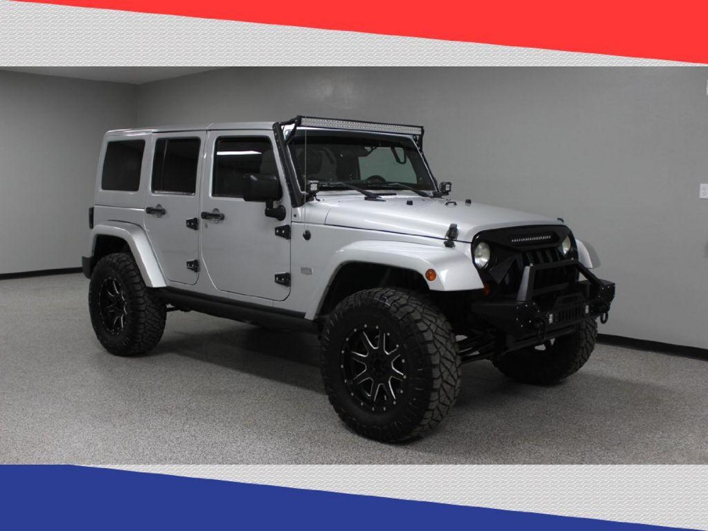 2011 Jeep Wrangler Jeep 70th Anniversary (1J4BA7H1XBL) with an 3.8L V6 OHV 12V engine, Automatic transmission, located at 5170 N La Cholla Blvd, Tucson, AZ, 85705, (520) 989-0282, 32.228245, -111.011742 - 2011 Jeep Wrangler - Photo#0